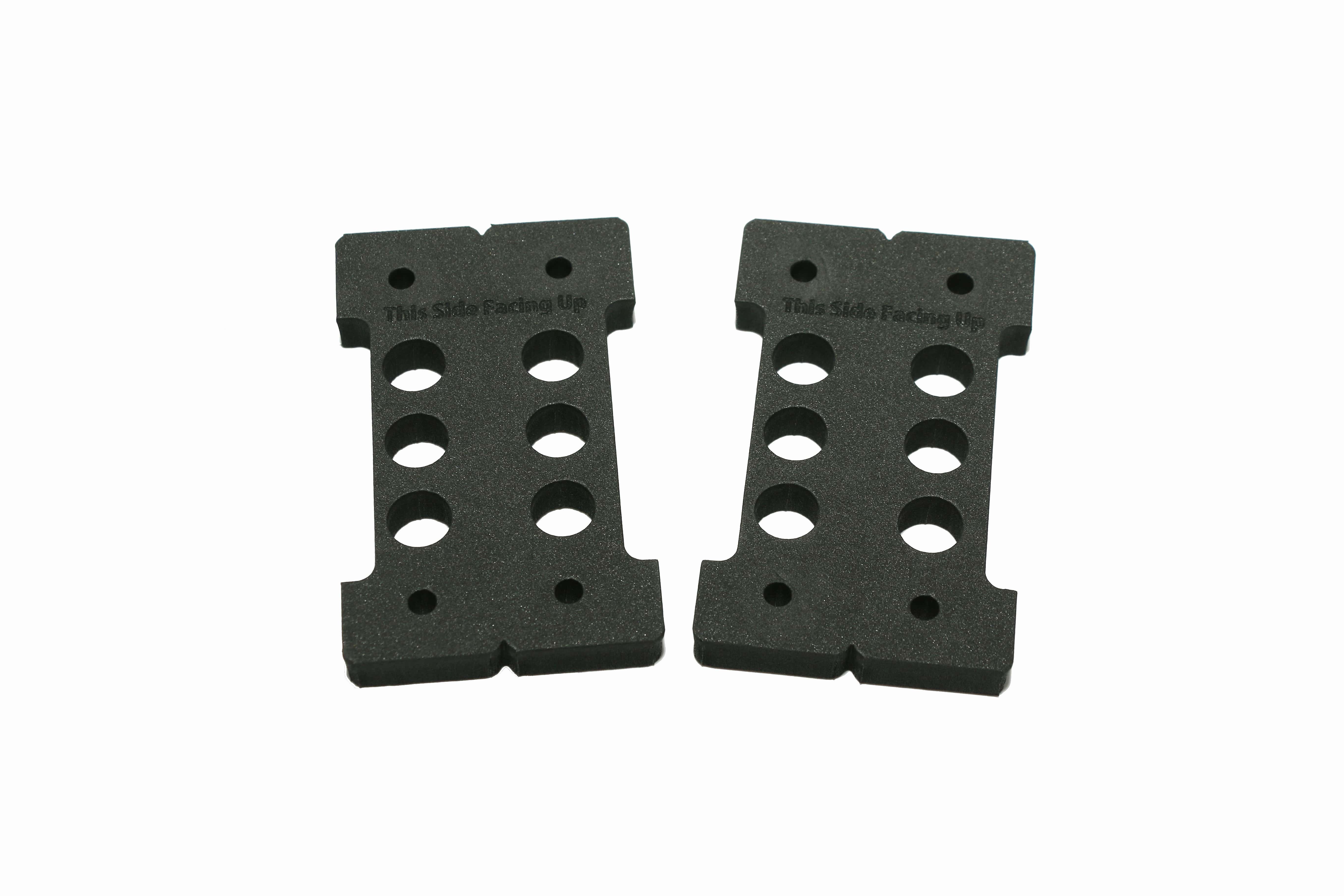 Black foam Foamanizer junction two-pack with two columns of circular holes and notched edges for fly tying