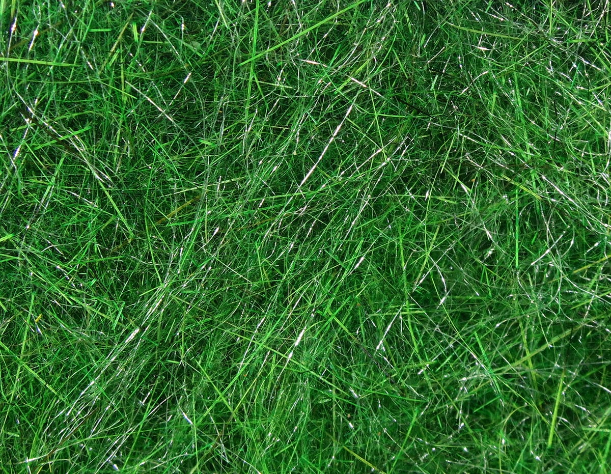 Emerald green Hare's Ear Plus dubbing: fine hare-like fibers with silver flash strands, synthetic fly tying material