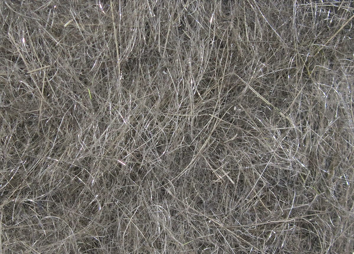 Gray-brown Hare-Tron dubbing fibers with fine sparkly flash, fluffy synthetic fur for fly tying