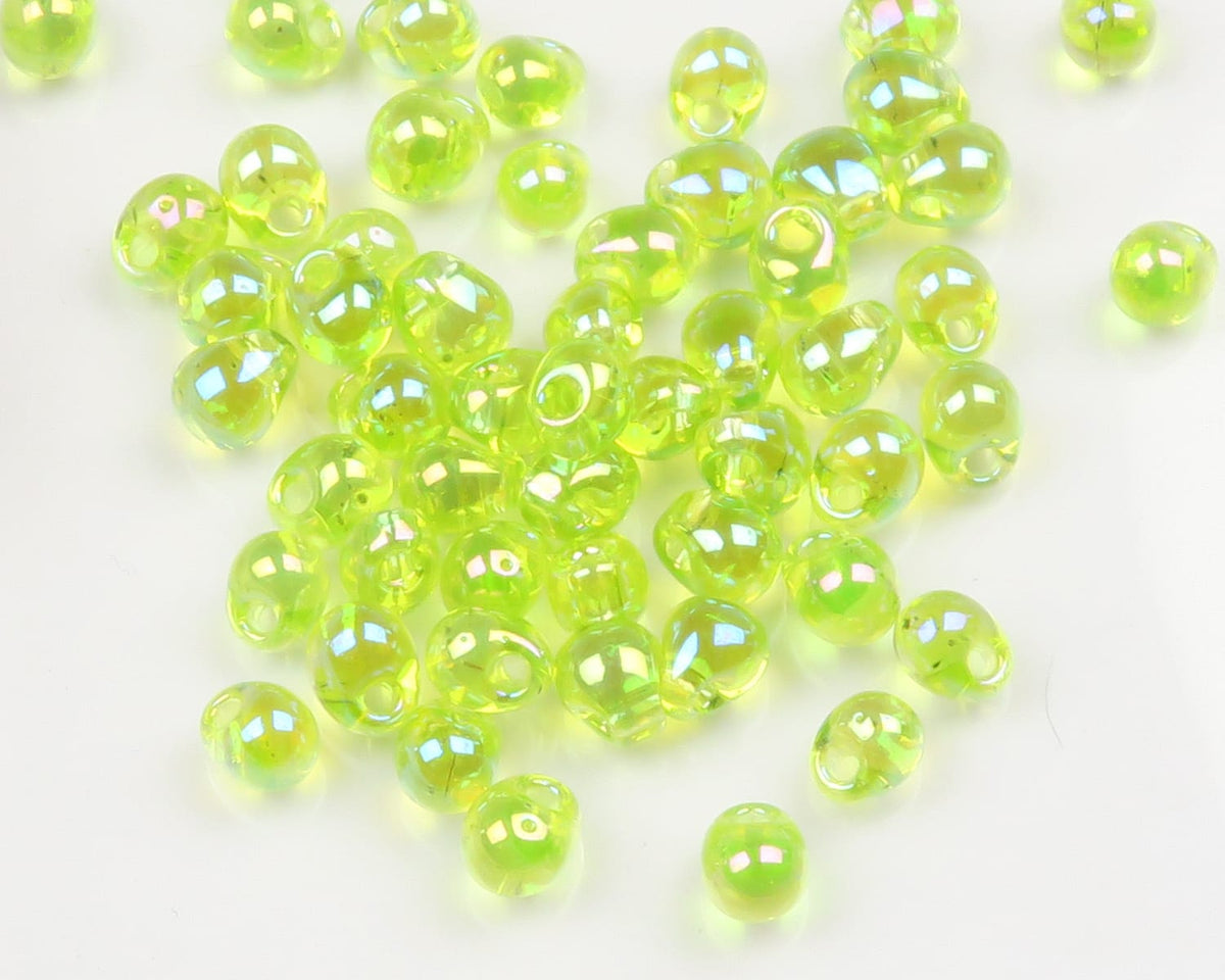 Iridescent lime hump-back glass beads with drilled holes, glossy AB finish for fly tying