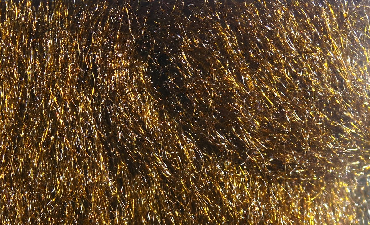 Hareline Ice Fur golden brown synthetic fur with metallic, iridescent fibers, fluffy textured material for fly tying