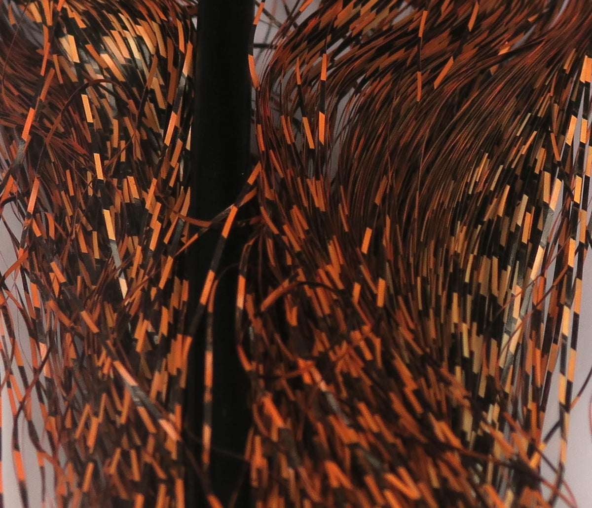Hareline micro black-barred Voodoo fibers, fine orange and black barred synthetic strands with metallic flash for fly tying