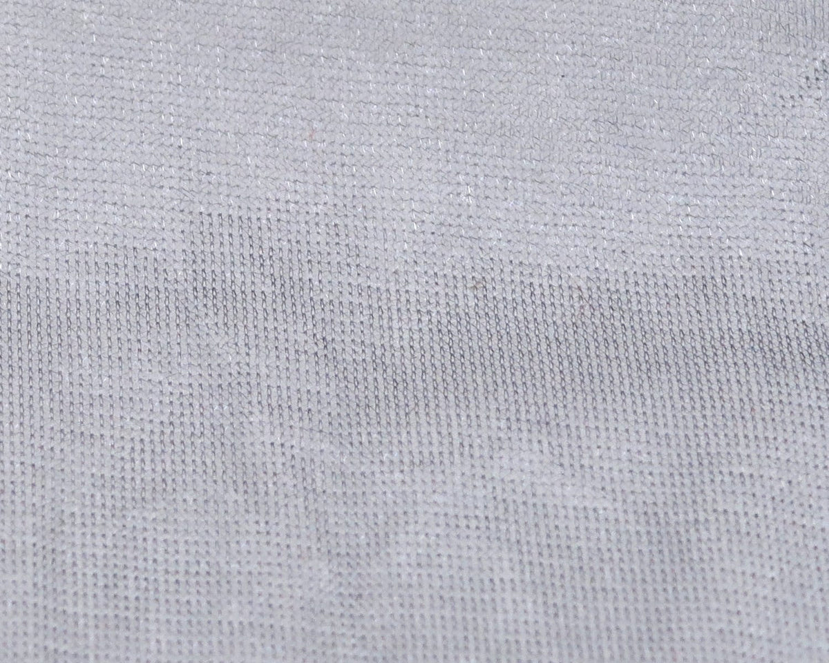 Pale gray Hareline No-Fray winging material with fine woven grid texture for fly tying