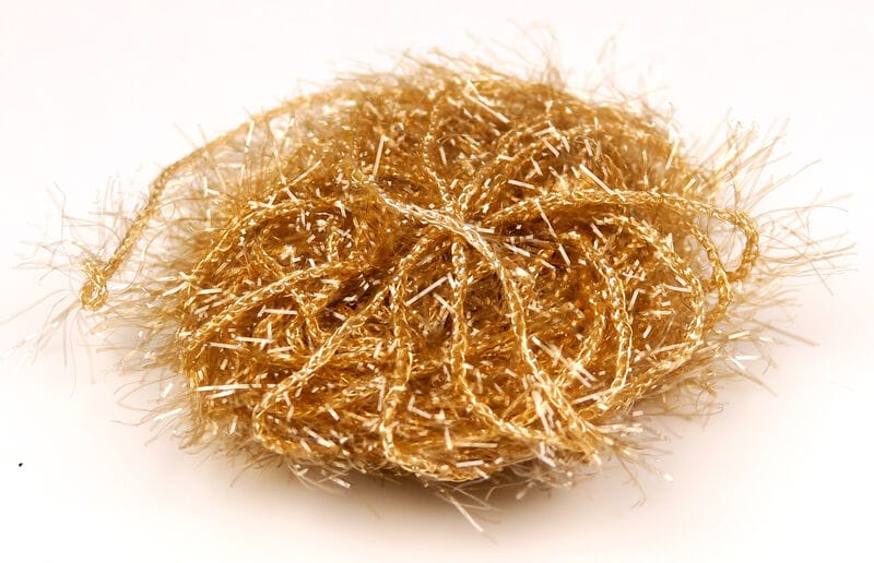 Gold Hareline Polar Chenille bundle with sparkling metallic tinsel fibers and fuzzy fringe, loose coil for fly tying
