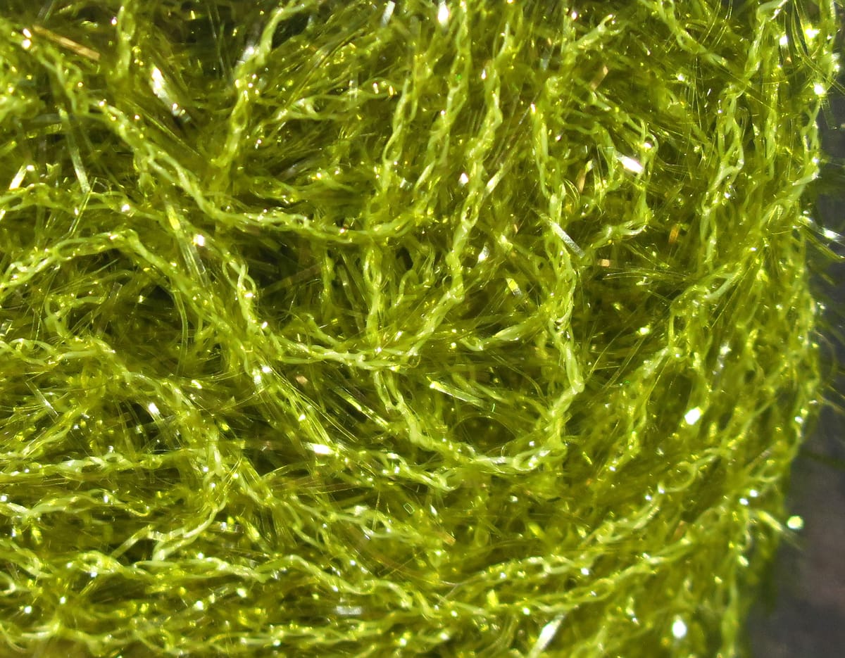 Hareline Polar chenille in bright chartreuse, sparkly fibrous synthetic yarn with iridescent strands