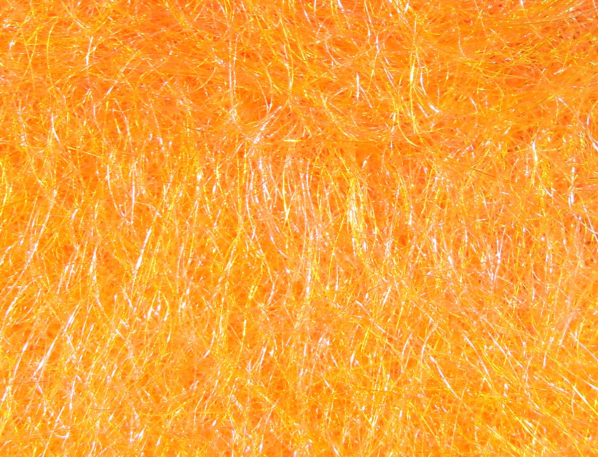 Bright orange Hareline Scud Dub fly tying dubbing with fine iridescent synthetic fibers, fluffy scud-style material