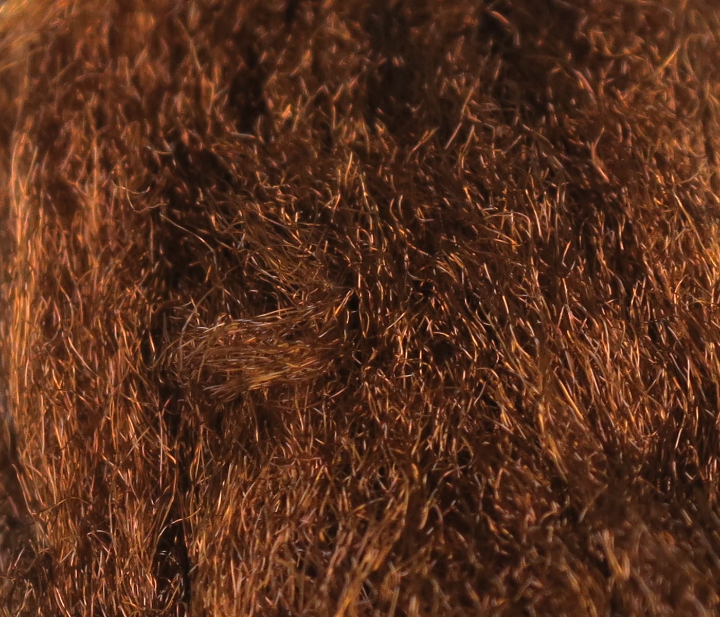 Copper brown Hareline Sparkle Emerger yarn with fine metallic sparkle fibers, fuzzy synthetic fly tying material