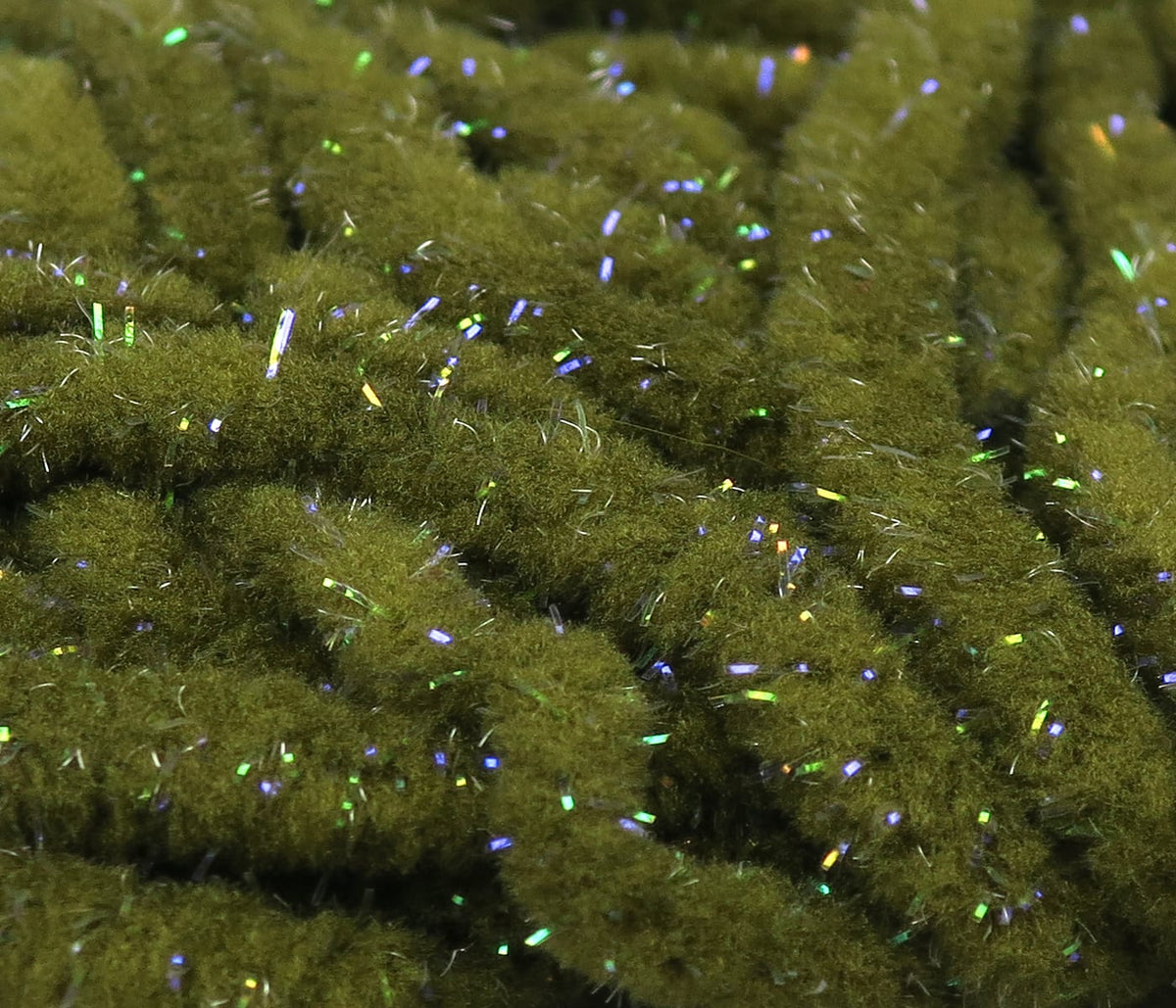 Olive green UV Galaxy mop chenille with dense fuzzy strands and iridescent holographic flash for fly tying