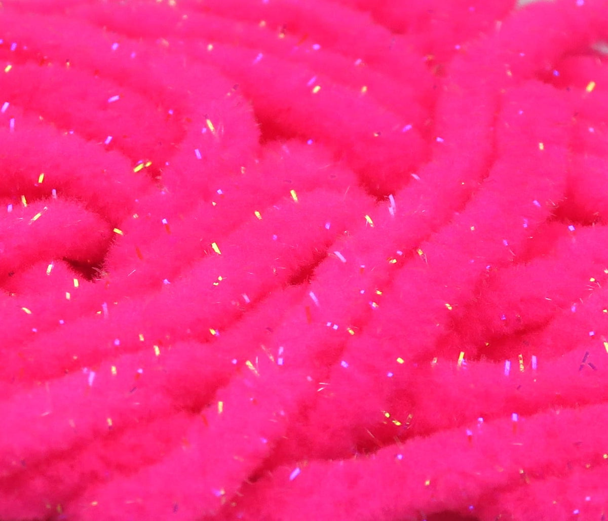 Hot pink Hareline UV Galaxy mop chenille with iridescent tinsel strands, fuzzy chenille for fly tying
