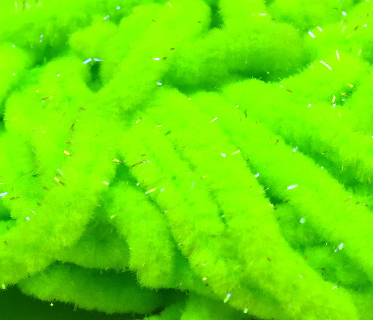 Fluorescent chartreuse Hareline UV Galaxy mop chenille strands with fuzzy fibers and metallic tinsel for fly tying