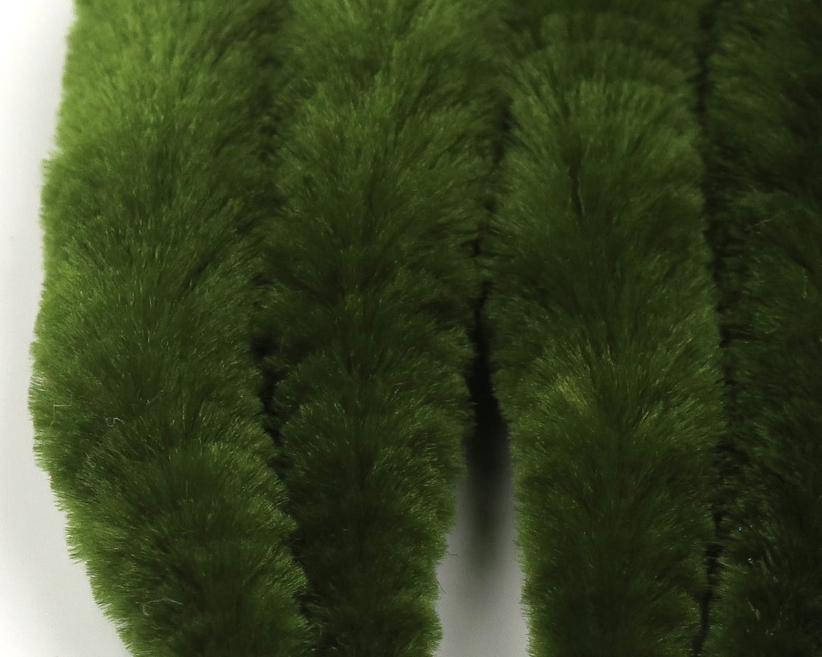 Olive green plush synthetic fur strips (Micro Dragon Tails) for fly tying, dense velvety texture and tapered tails