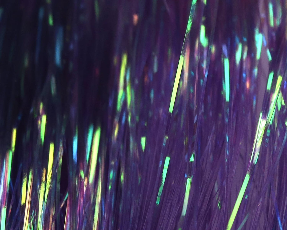 Purple dyed pearl Flashabou strands with iridescent green-yellow highlights, fine metallic tinsel for fly tying
