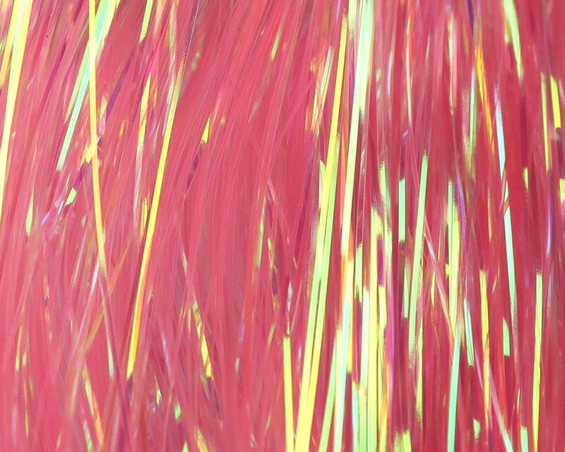 Pink dyed pearl Flashabou strands with iridescent gold-yellow highlights, tinsel-like synthetic fibers for fly tying