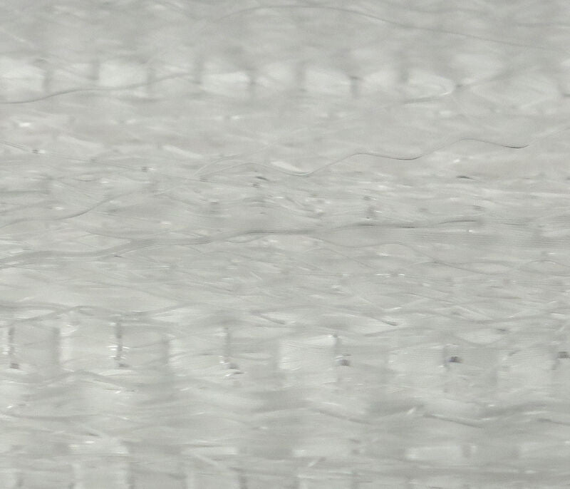 Translucent white synthetic hair fibers for fly tying, fine wispy bundled strands with subtle sheen