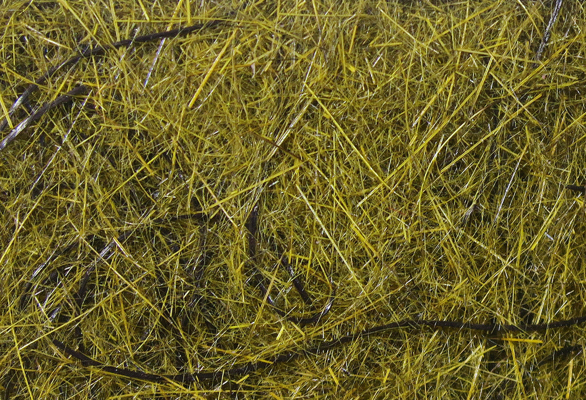 Olive-yellow Hareline Hare'E Wiggle Dub dubbing with wispy hare fibers, black guard hairs and subtle flash for fly tying