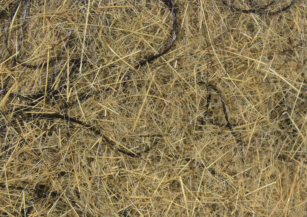 Tan and olive hare fur dubbing with long wispy fibers and intermittent black rubbery wiggle strands for fly tying