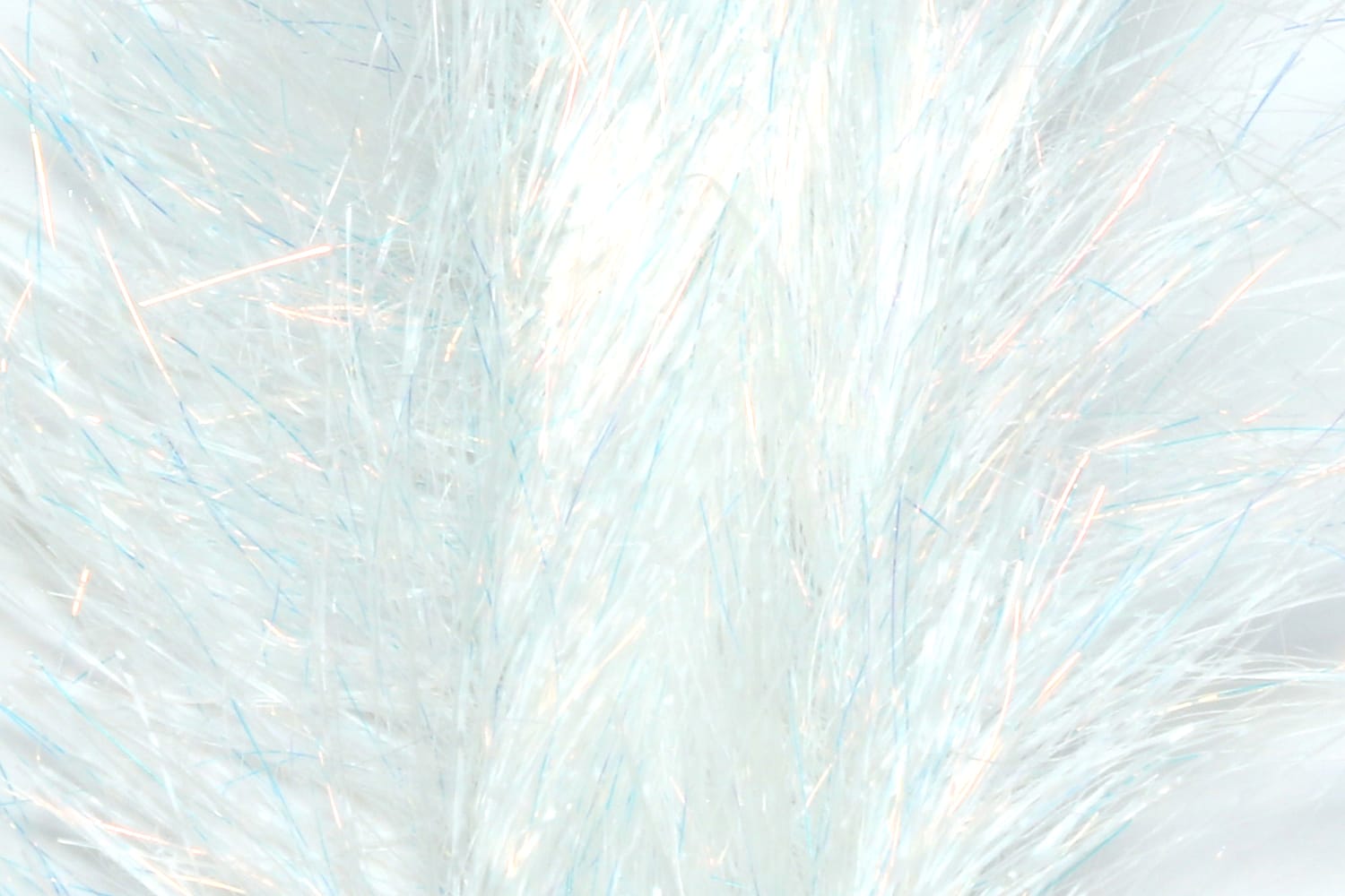 White translucent synthetic fly brush with iridescent blue and silver tinsel fibers, fluffy for fly tying