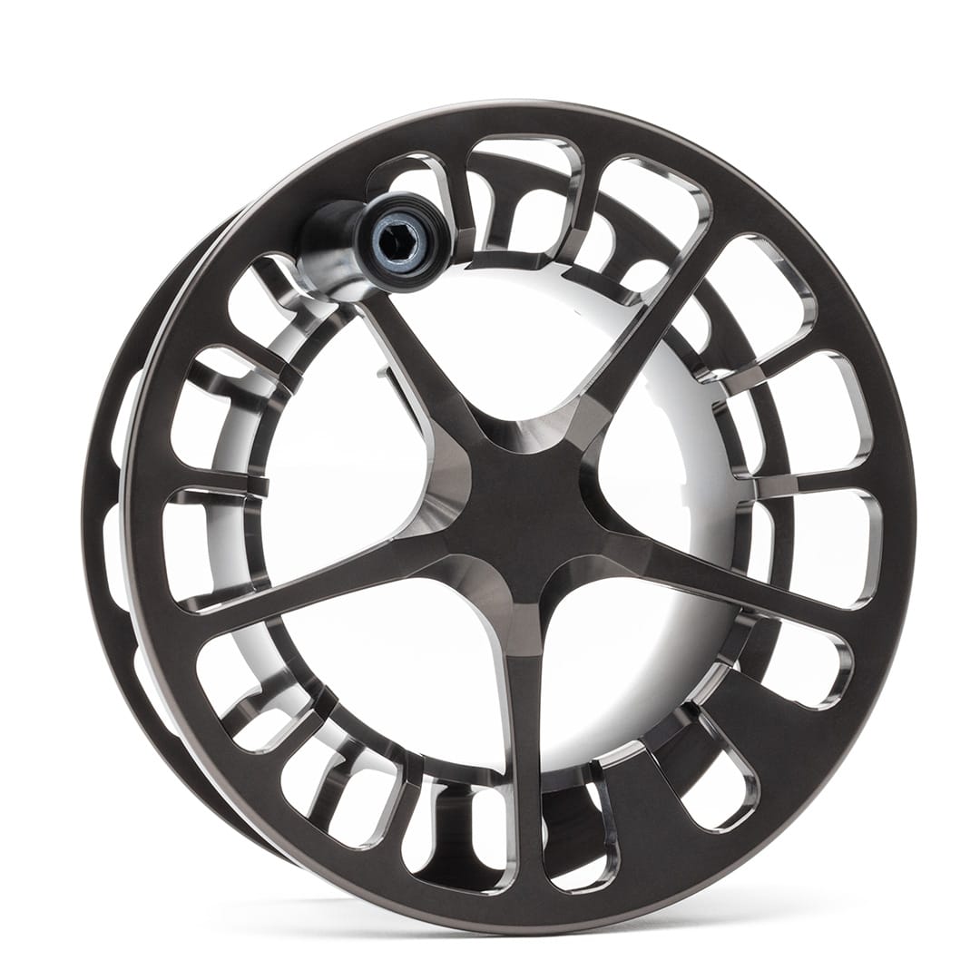 Lamson Guru X black fly reel spool with precision-machined aluminum design and large arbor construction for saltwater fishing