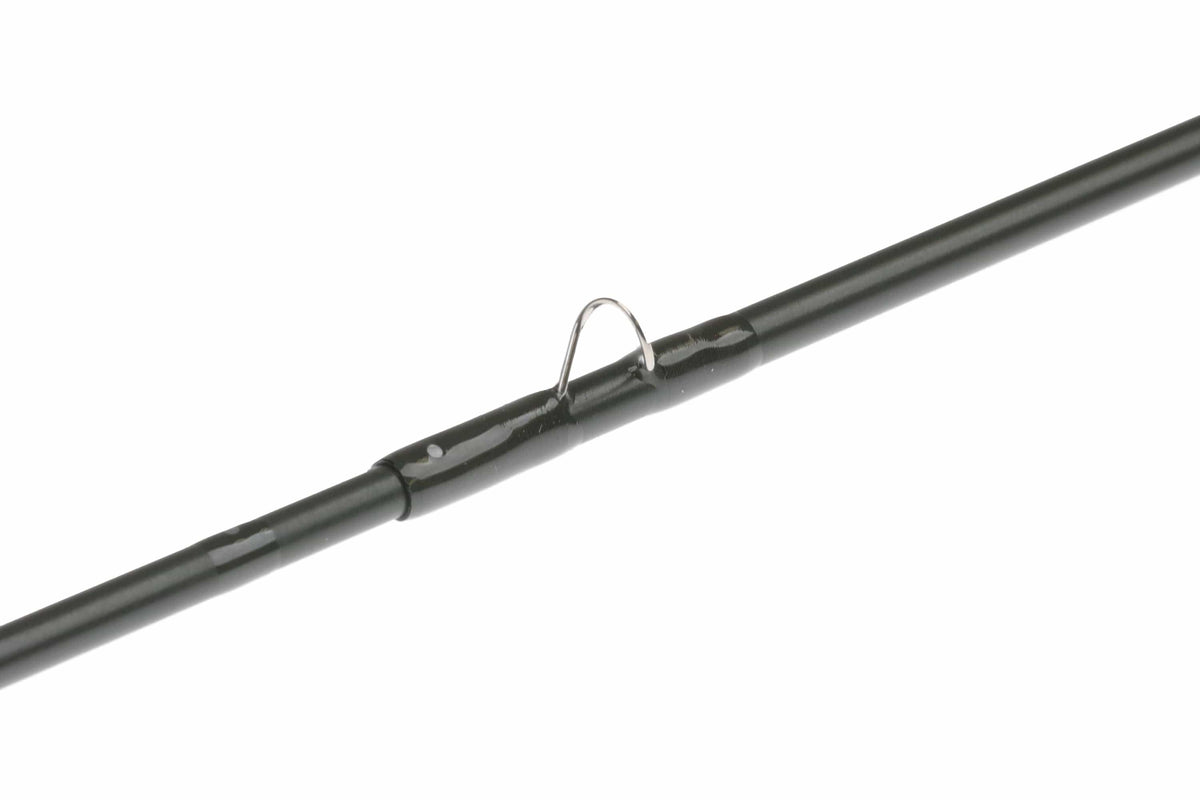 Orvis Recon 3 dark olive graphite fly rod close-up showing glossy blank, metal guide and wrapped ferrule detail
