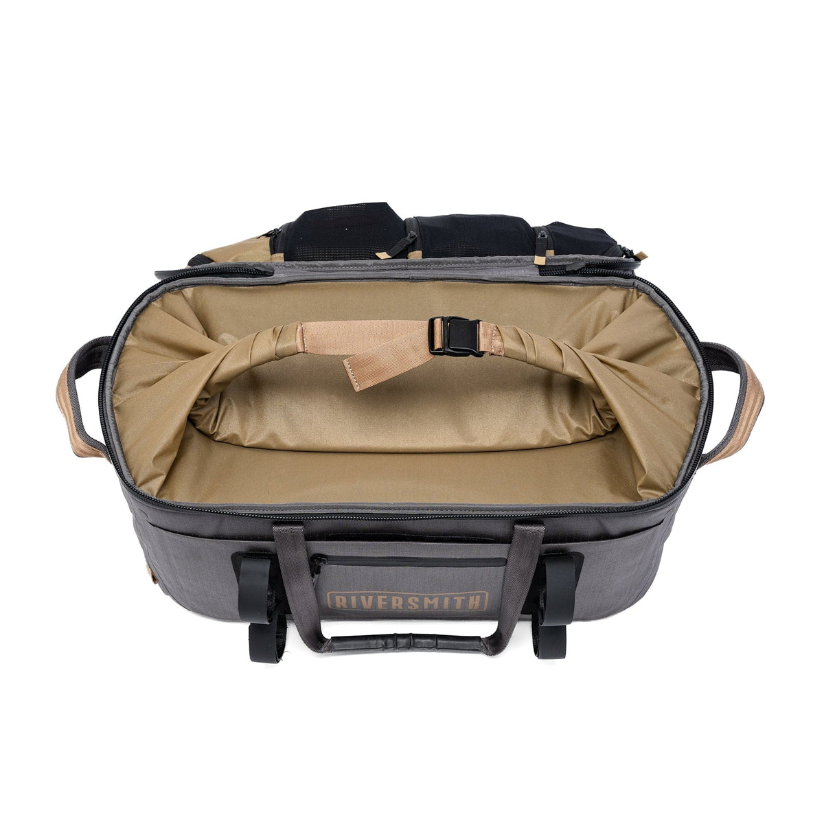 Riversmith gray waterproof duffel bag with tan interior, black handles, and top organizational pockets, open view
