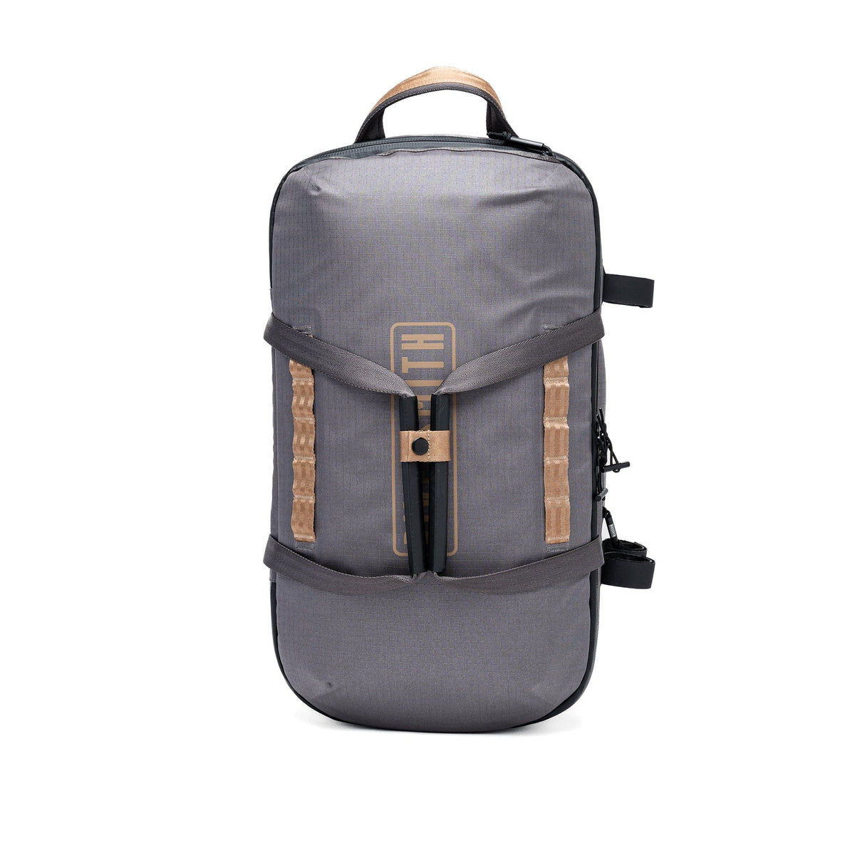 Gray waterproof duffel bag with tan leather accents and top handle for travel and outdoor storage
