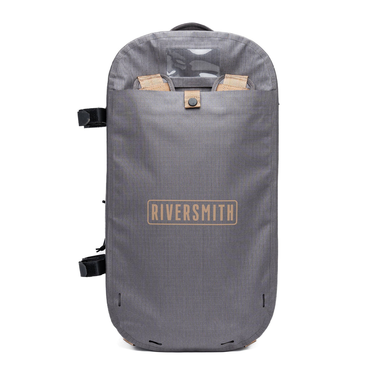 Riversmith gray waterproof duffel bag with tan handles and shoulder straps, front view