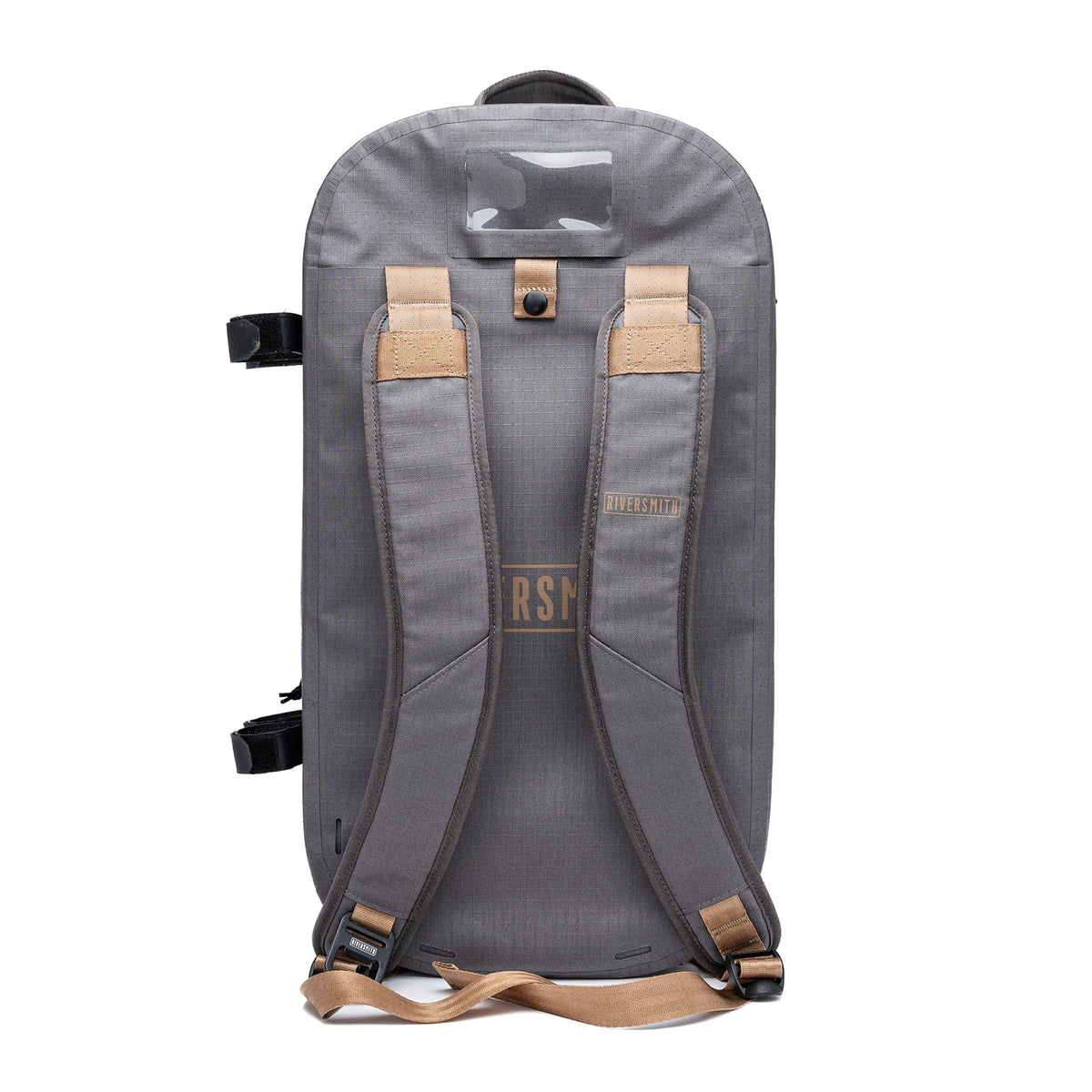 Gray waterproof duffel bag with tan leather straps and backpack-style shoulder harness for travel gear transport