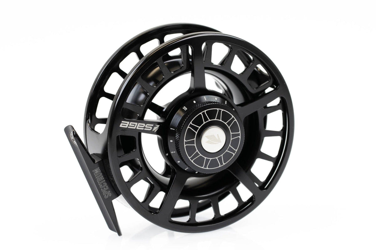 Black anodized Sage Spectrum fly reel with machined vented large-arbor spool and textured aluminum drag knob
