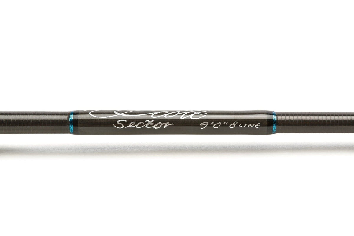 Scott Sector fly rod section in dark graphite carbon with glossy finish, white script logo and blue metallic trim