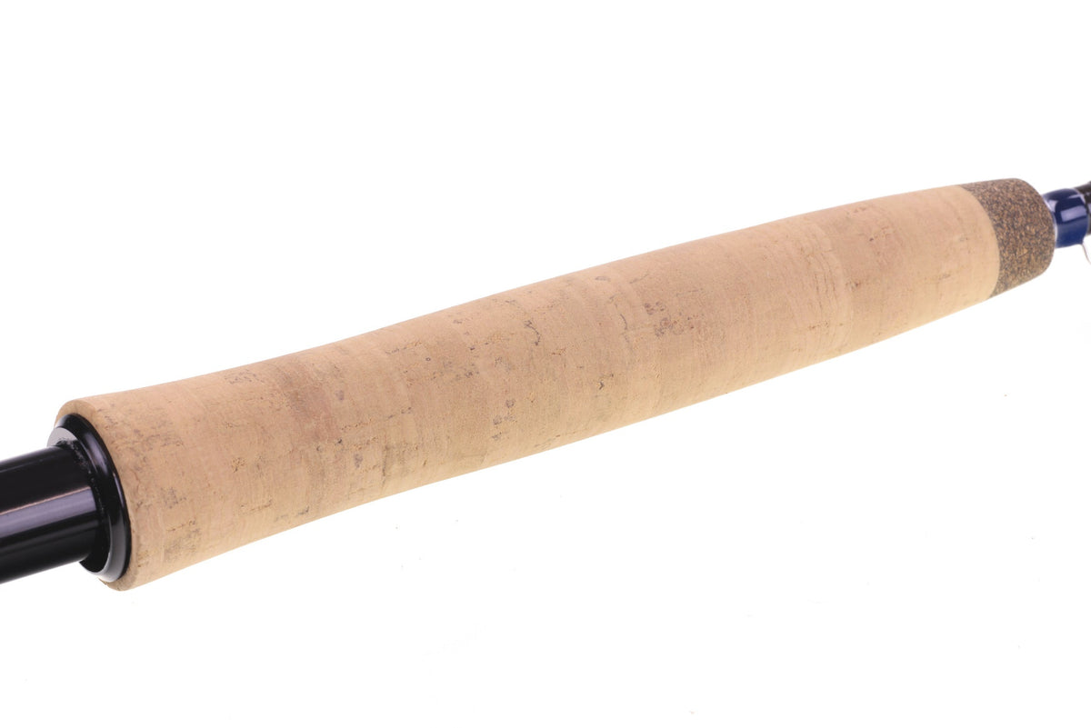 Thomas & Thomas Zone 2.0 fly rod with tan cork handle, black reel seat, and blue-accented ferrule on white background