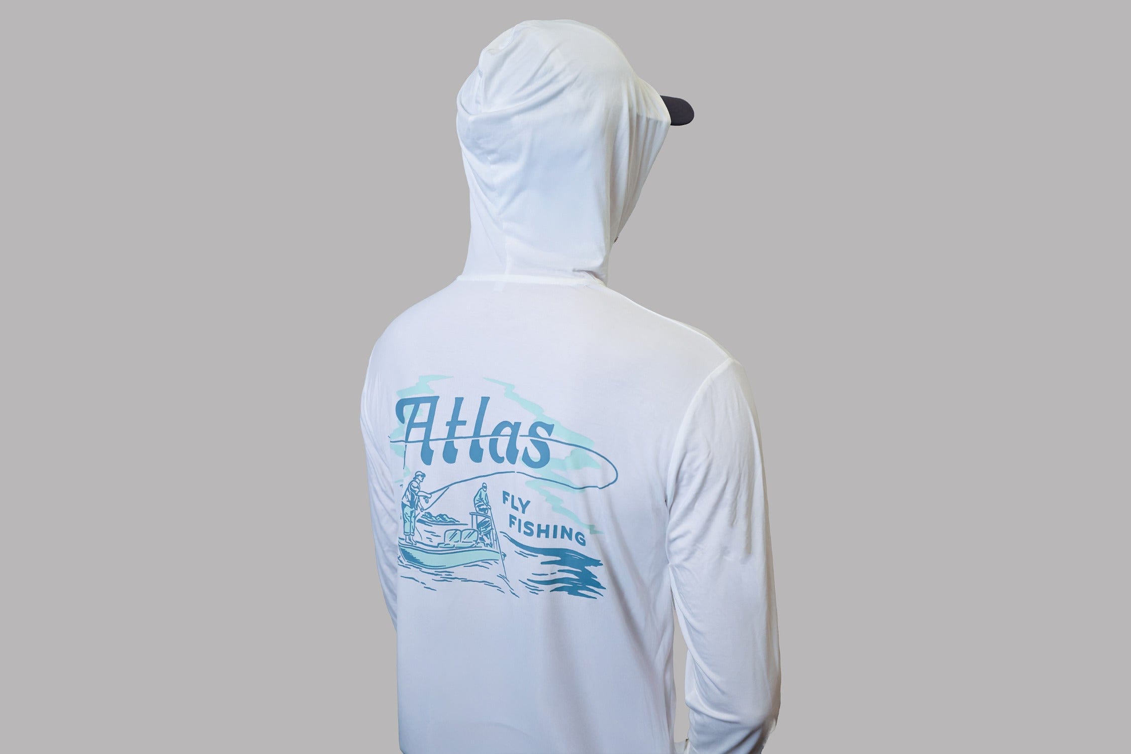 White bamboo sun hoodie with hood up, teal Atlas fly fishing back graphic showing two anglers in a boat