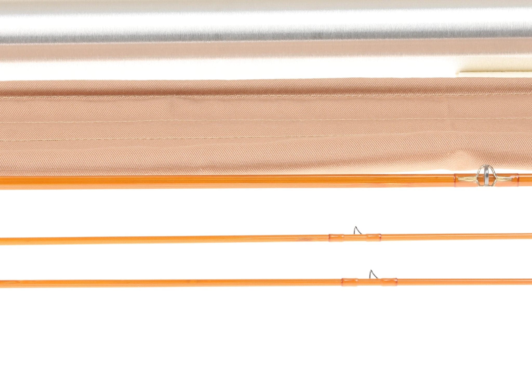 H.L. Leonard Centennial orange bamboo fly rod sections with silver guides laid above tan fabric sleeve and aluminum tube