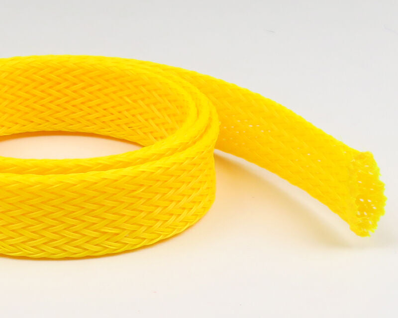 Bright yellow braided plastic body tubing coil with open mesh end, flexible fly tying material
