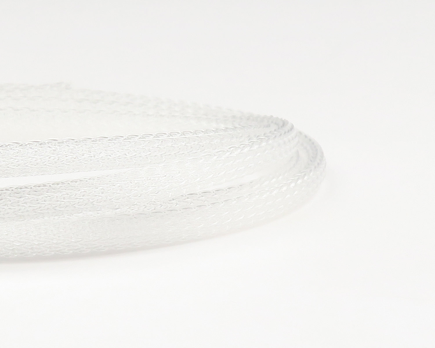 Clear translucent braided synthetic body tubing coil for fly tying, fine mesh plastic tube by Fish-Skull