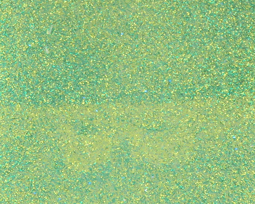 Green-gold iridescent crystal skin sheet with fine holographic flakes, sparkly fly tying material