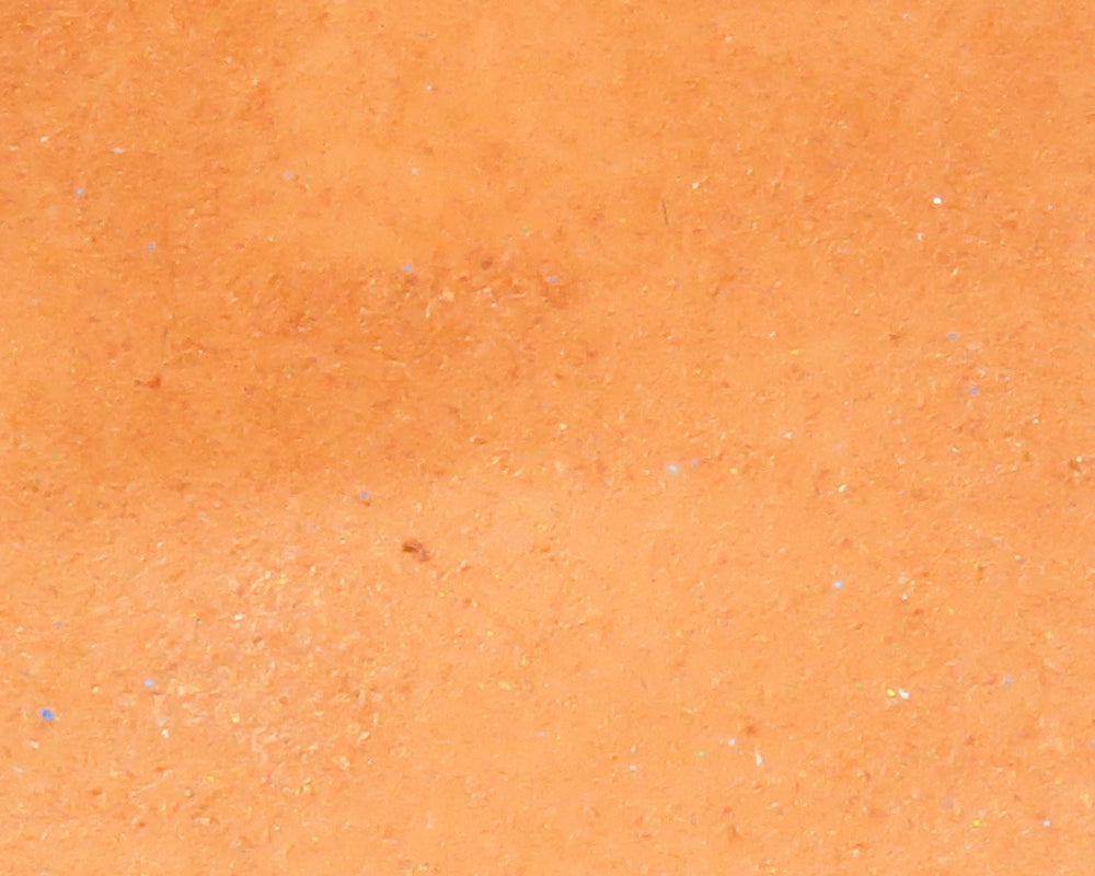 Orange D's Flyes Crystal Skin sheet — textured synthetic fly tying material with subtle iridescent micro-fleck sparkle