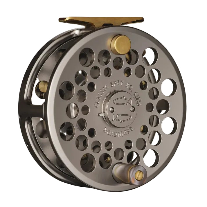 Gunmetal Redington Classic Spey fly reel with perforated spool, brass drag knob and handle, engraved logo