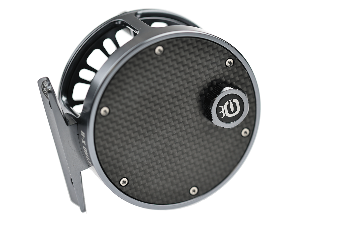 Cortland Retro Click Fly Reel in gunmetal gray with carbon fiber drag disc and exposed mechanical click system