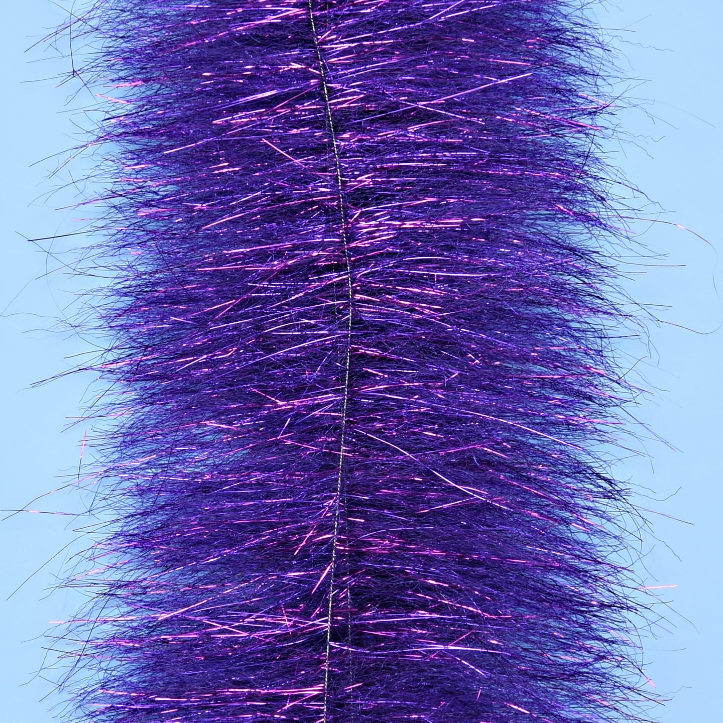 Purple iridescent synthetic Anadromus brush with dense long shimmering fibers for fly tying