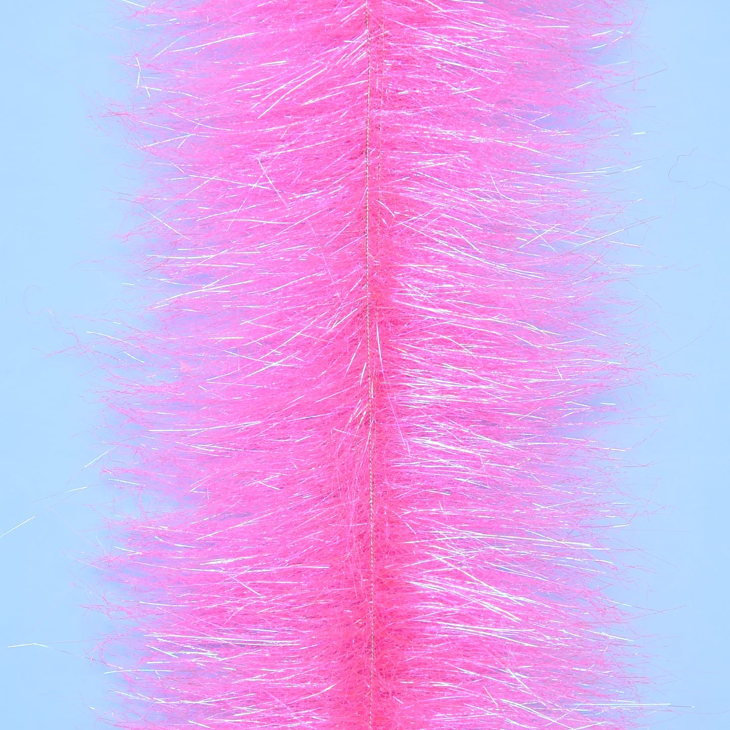 Neon pink Enrico Puglisi Anadromus fly tying brush with fluffy synthetic fibers and silver iridescent strands
