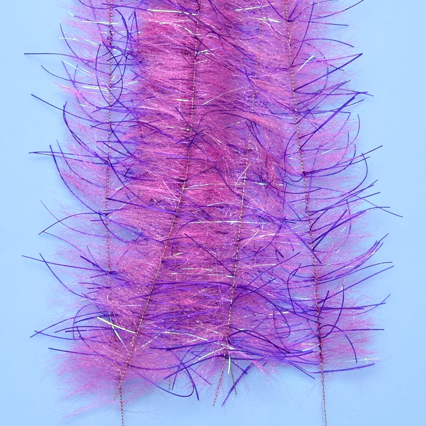 Purple-pink Enrico Puglisi Tarantula Hairy Legs brush fibers with iridescent tinsel and feathery synthetic legs for fly tying