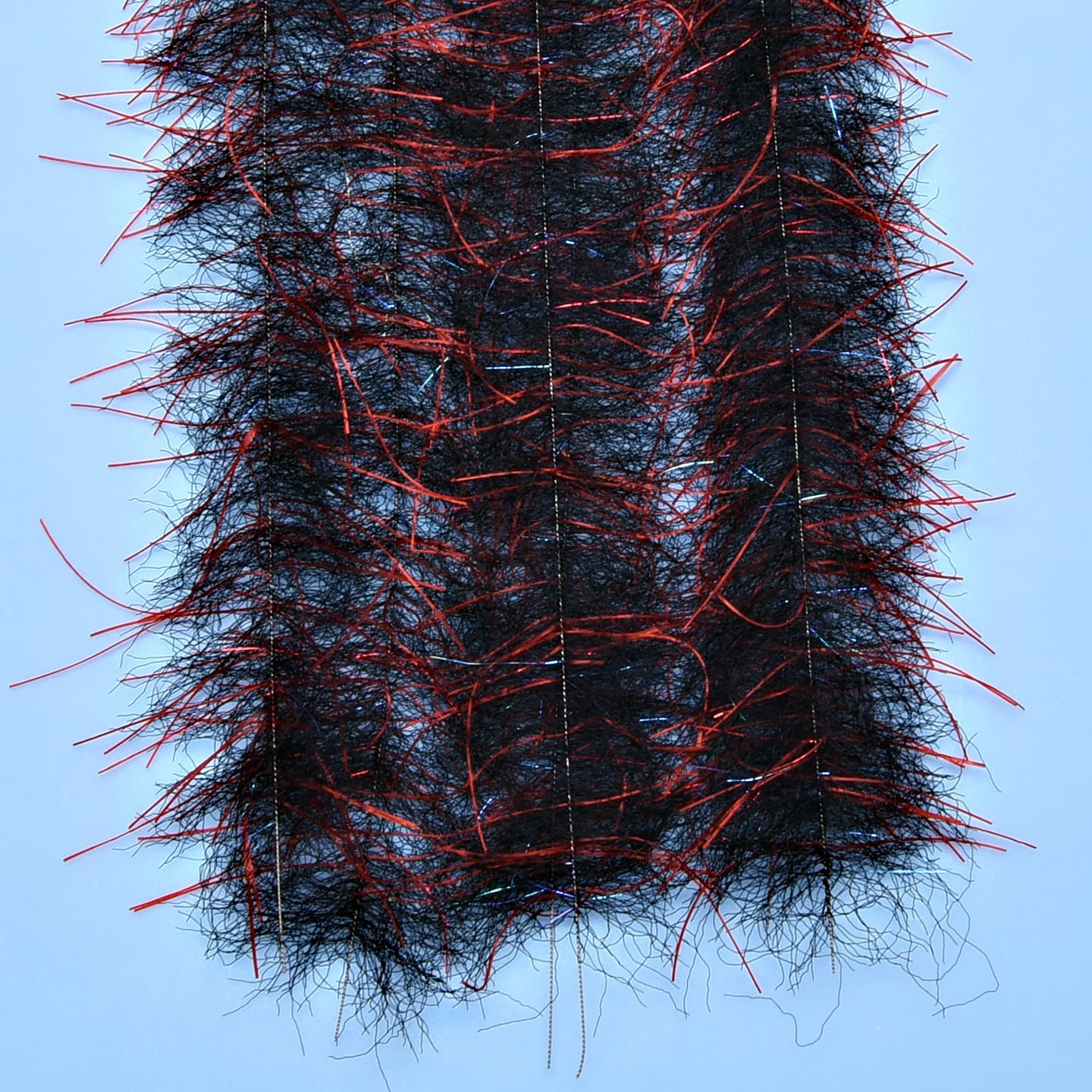 Black tarantula hairy legs brush with red tinsel legs and dense synthetic fur for fly tying