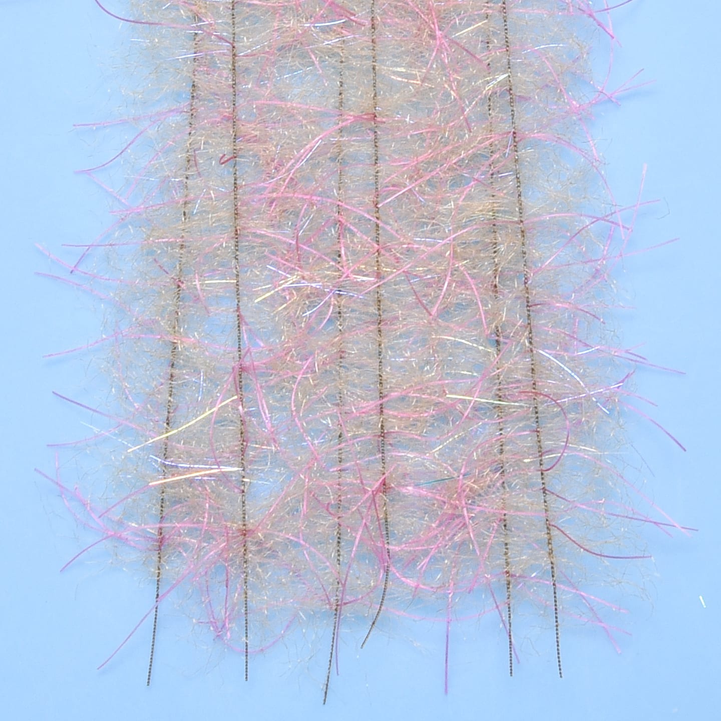 Enrico Puglisi Tarantula hairy legs brush with tan synthetic fuzz and pink iridescent strands on stitched strips for fly
