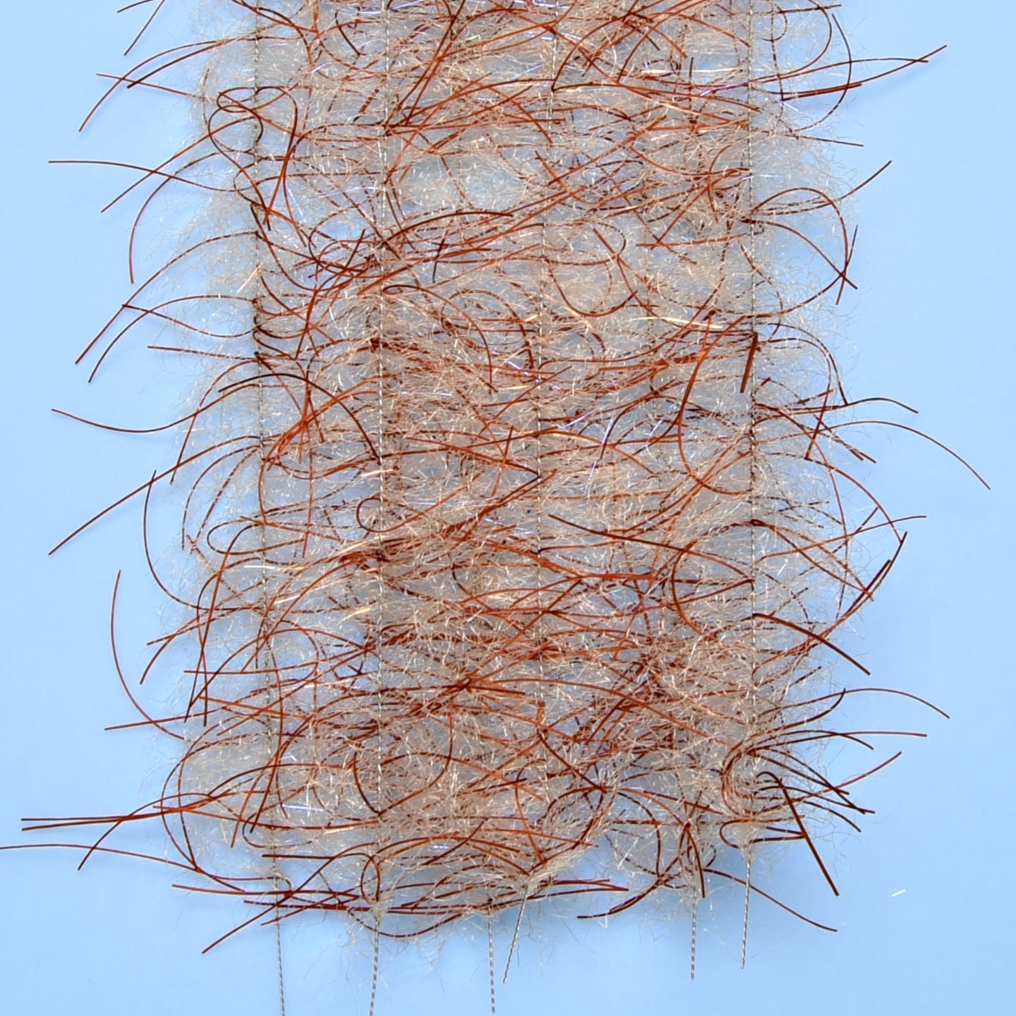 Enrico Puglisi Tarantula Hairy Legs fly tying brush strip with beige fuzzy synthetic fibers and copper brown stiff legs