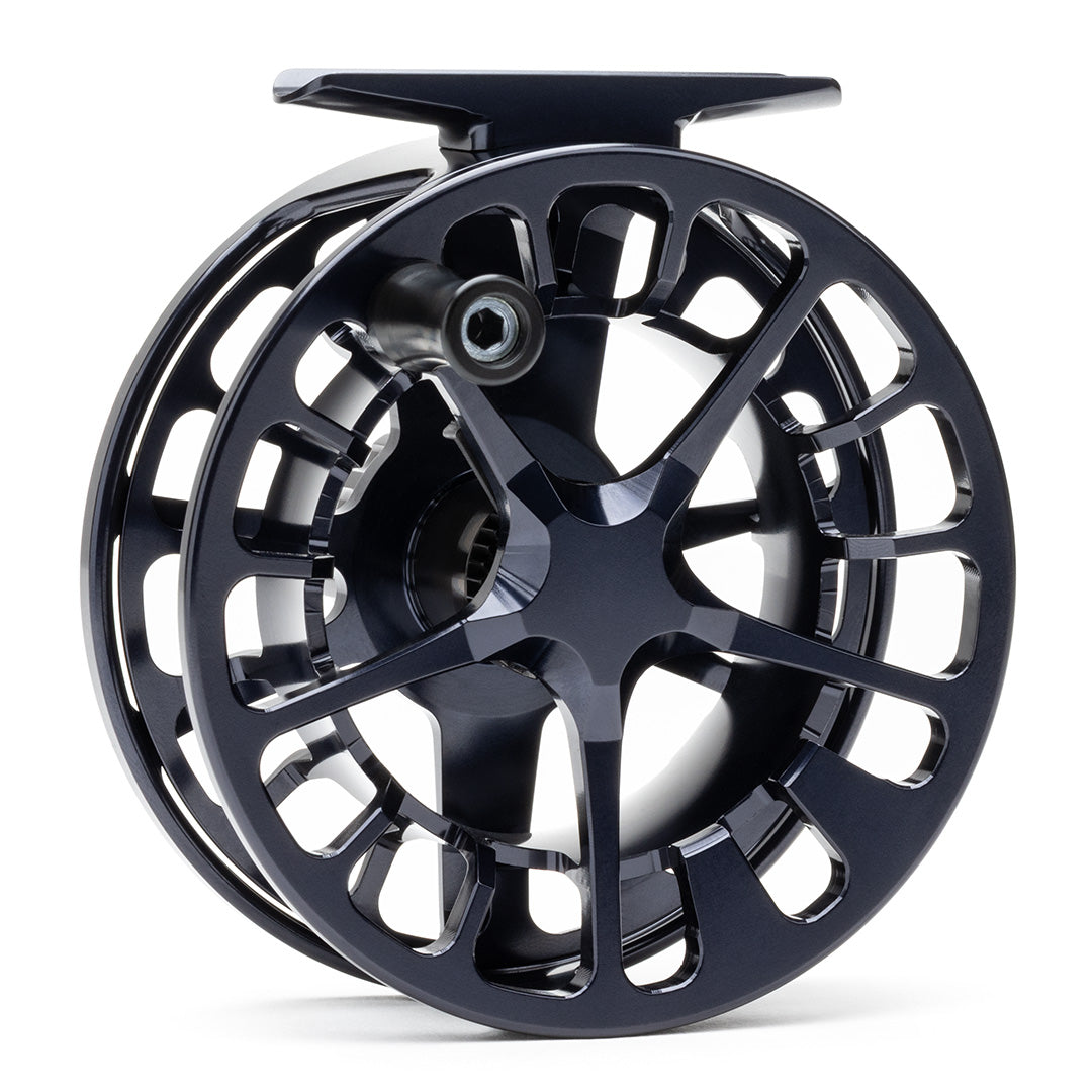 Black Lamson Guru X fly reel with large arbor design and skeletal frame construction featuring ventilated spool design for