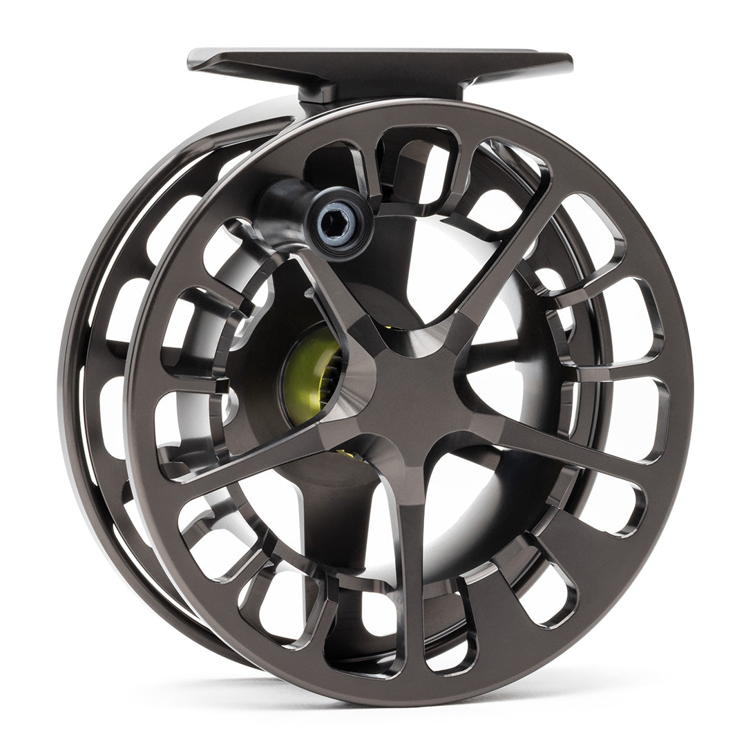 Charcoal gray Lamson Guru X fly reel with skeletal design, large arbor spool, and lime green drag system detail
