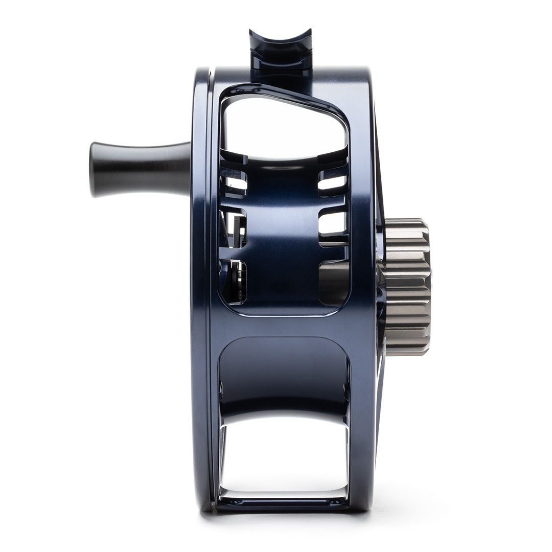 Lamson Guru X HD fly reel in blue with metal spool and drag system, side view