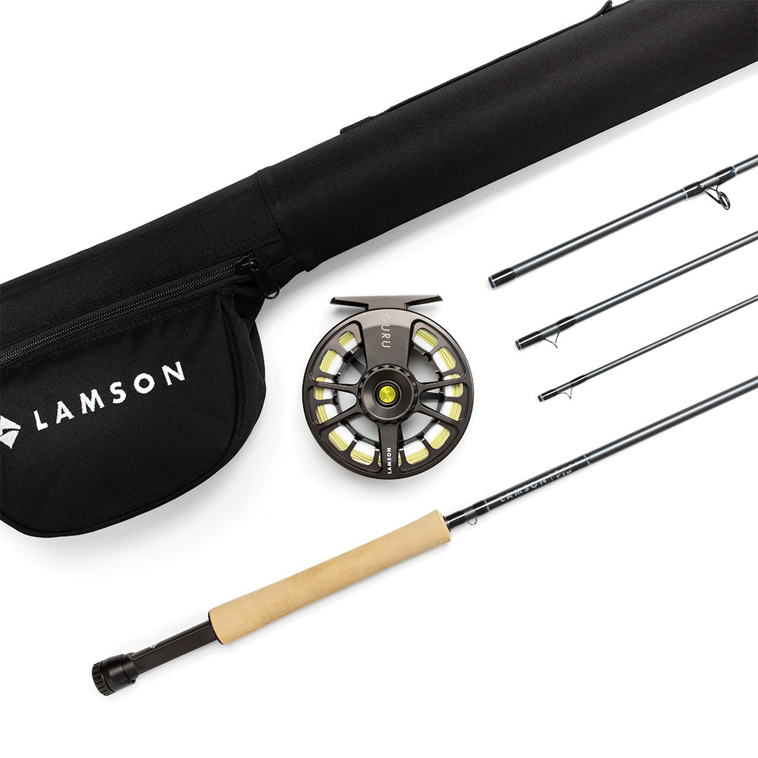 Lamson Guru fly rod outfit with black rod case, cork handle rod, spare sections, and black anodized reel with yellow accents
