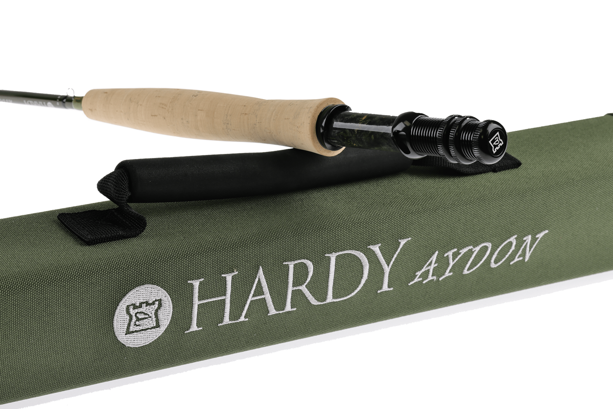 Hardy Aydon fly rod with cork handle and black reel seat on green rod case with logo