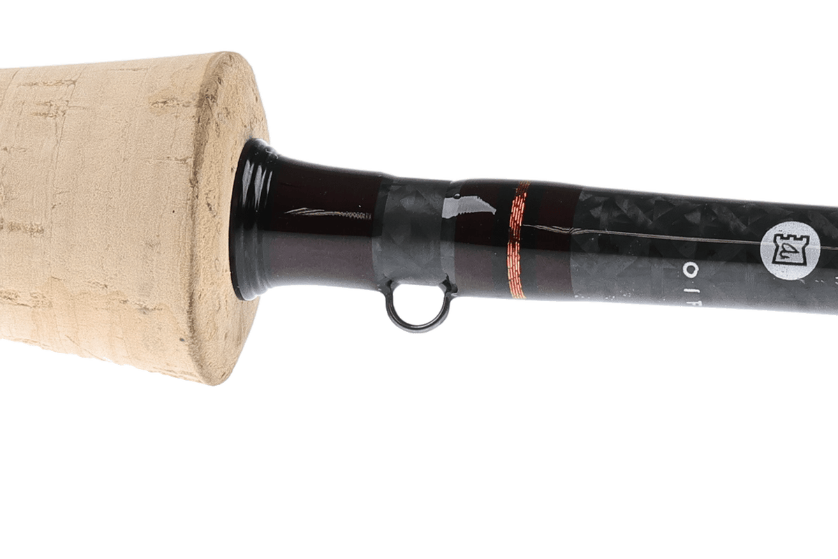 Hardy Firecrest fly rod with cork grip and black carbon fiber blank, angled side view